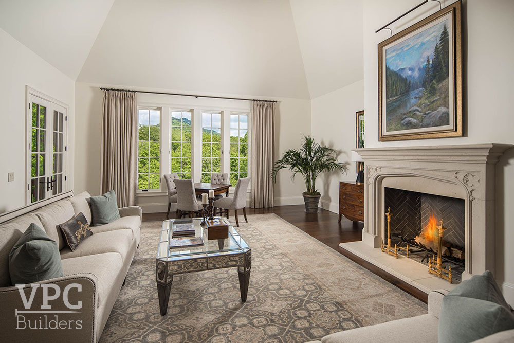 Country French Cottage sitting area with fireplace