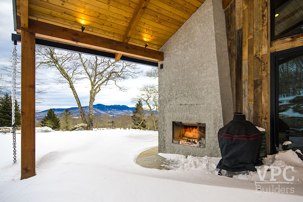 Contemporary Mountaintop Escape outdoor fireplace/patio
