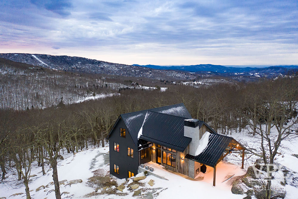 Contemporary Mountaintop Escape exterior with view of mountains