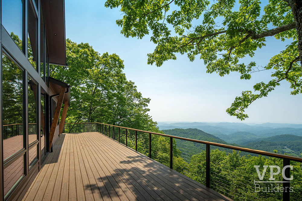 Contemporary Scenic Solitude deck overlooking mountains