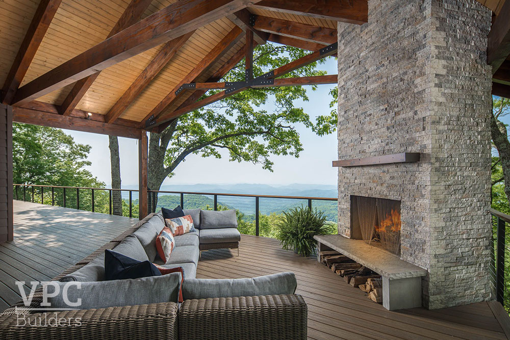 Contemporary Scenic Solitude deck with fireplace