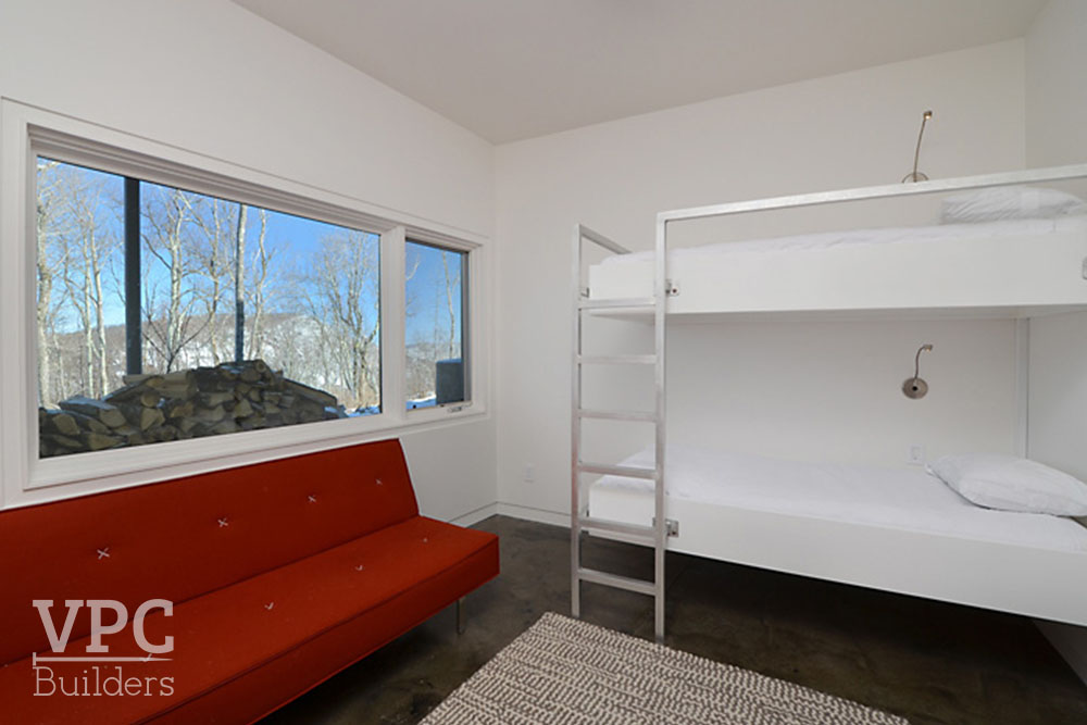 Modern Geothermal Home bedroom with bunk beds