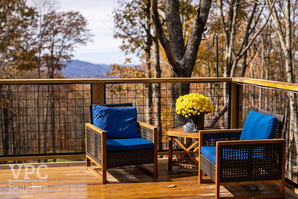 Rustic Mountain Residence deck with view of mountains