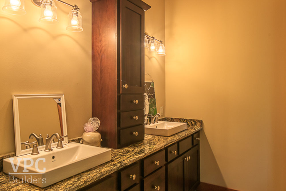 Sweet Pea Home bathroom with dual vanity