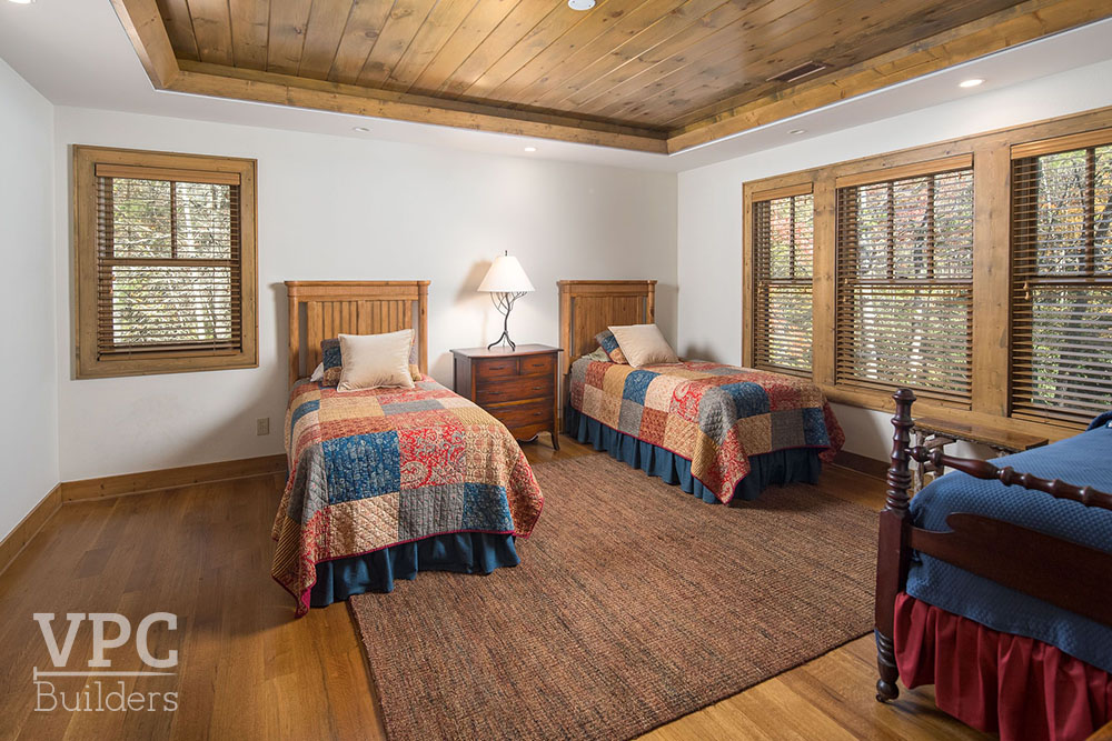 Twin Rivers Home bedroom with twin beds