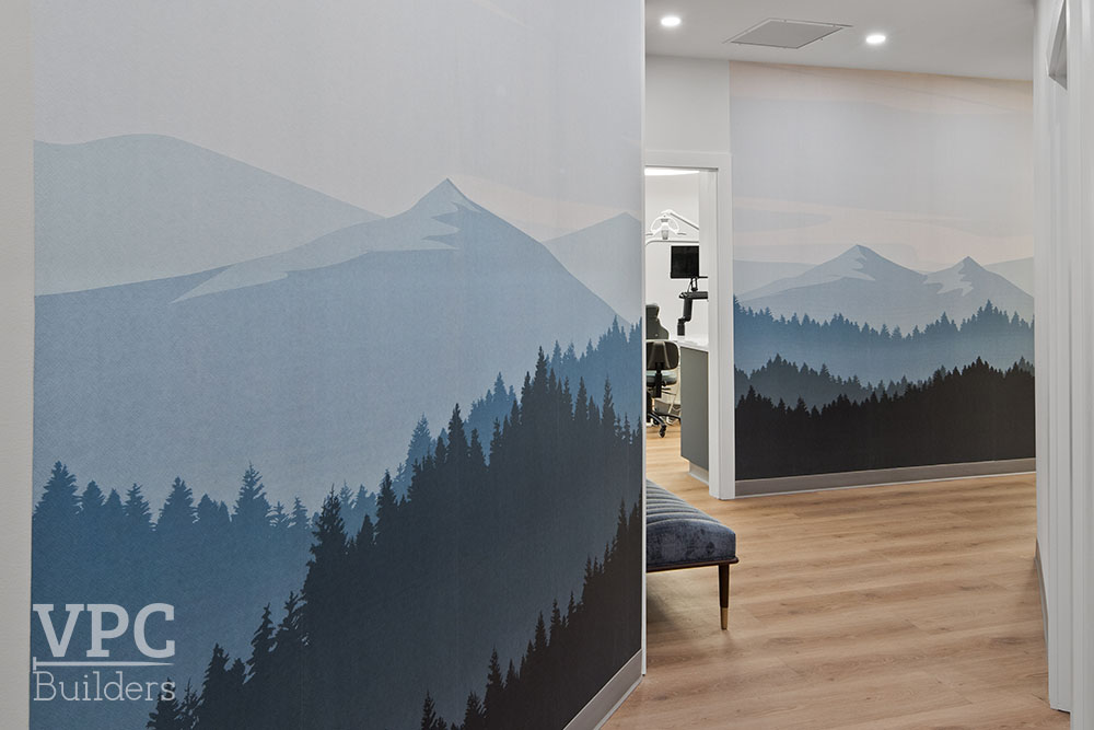 OP Smiles hallway with decorative wallpaper